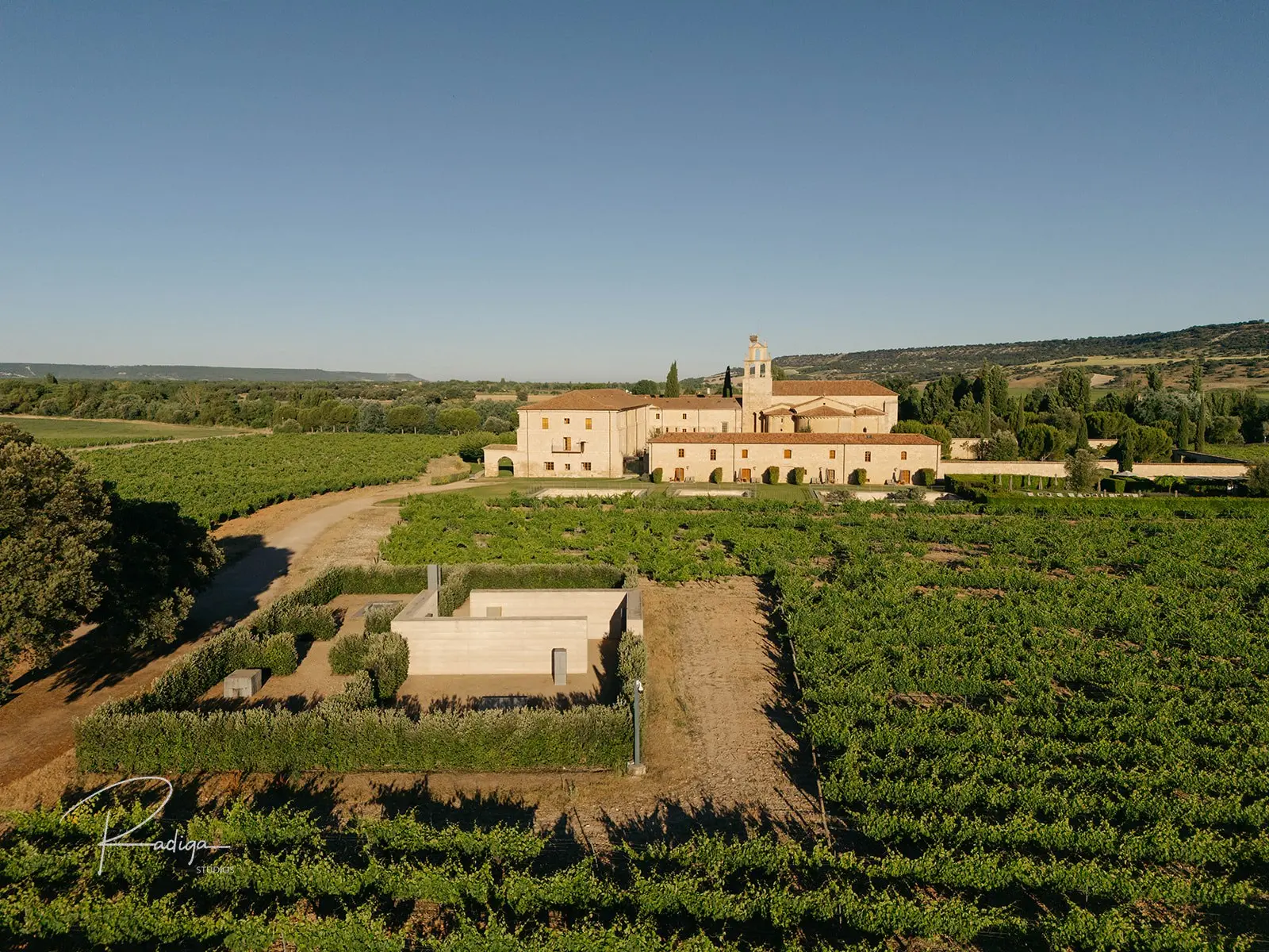 Aerial view of Abadía Retuerta surrounded by vineyards in Ribera del Duero